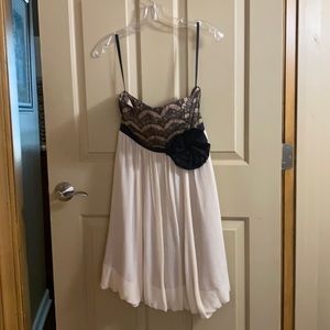 Size 6 100% silk not including adornments